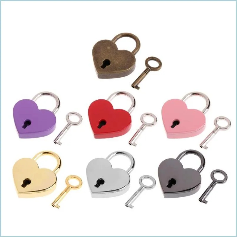 Door Locks kitchen handles Heart Shape Vintage Metal Mini Padlock Small Bag Suitcase Lage Box Diary Book Key Lock With Drop Delivery Home Garden Bui
Door Locks kitchen handles Heart Shape Vintage Metal Mini Padlock Small Bag Suitcase Lage Box Diary Book Key Lock With Drop Delivery Home Garden Bui