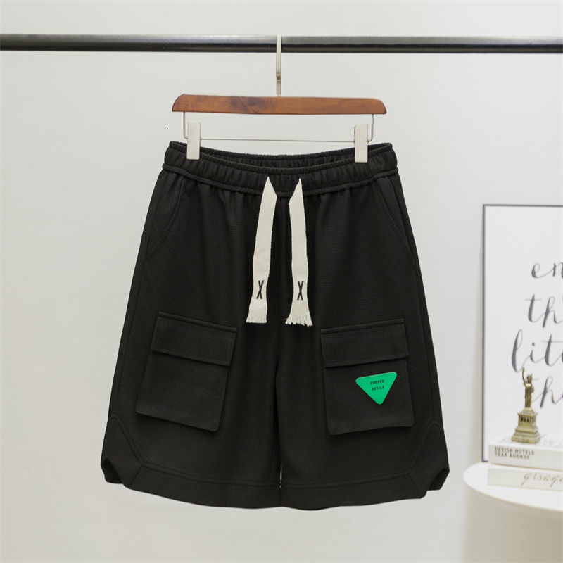 Men's Shorts Personalized shorts street goods large pockets half pants green leather labels drawstring casual shorts men's youth pants Capri