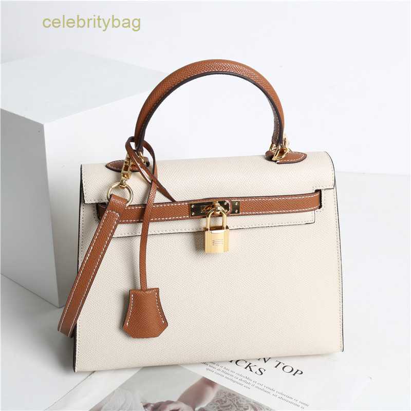 Designer Kellies Handbags Hemres 2023 Genuine leather spring new fashion high quality portable one-shoulder cross-body second-generation has logo I07P, Milkshake white/golden brown (color
Designer Kellies Handbags Hemres 2023 Genuine leather spring new fashion high quality portable one-shoulder cross-body second-generation has logo I07P, Milkshake white/golden brown (color