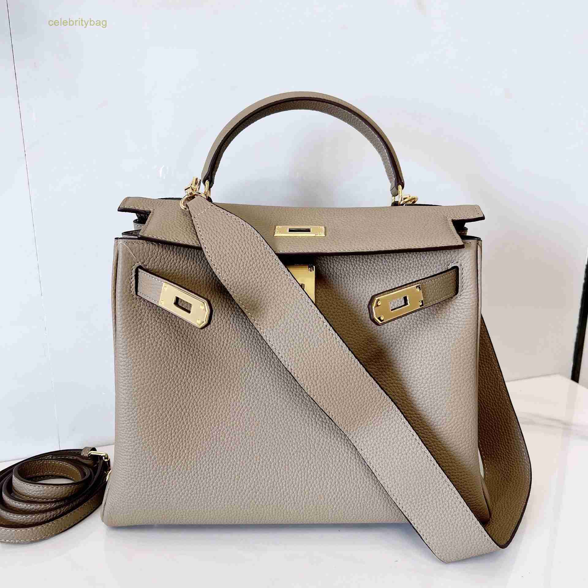 Designer Kellies Handbags Hemres Genuine Leather Bag Women's 2023 New Togo Top Layer Cowhide Premium Wide Shoulder Strap Single Crossbody Handbag has logo GZ3K, Elephant grey gold buckle
Designer Kellies Handbags Hemres Genuine Leather Bag Women's 2023 New Togo Top Layer Cowhide Premium Wide Shoulder Strap Single Crossbody Handbag has logo GZ3K, Elephant grey gold buckle