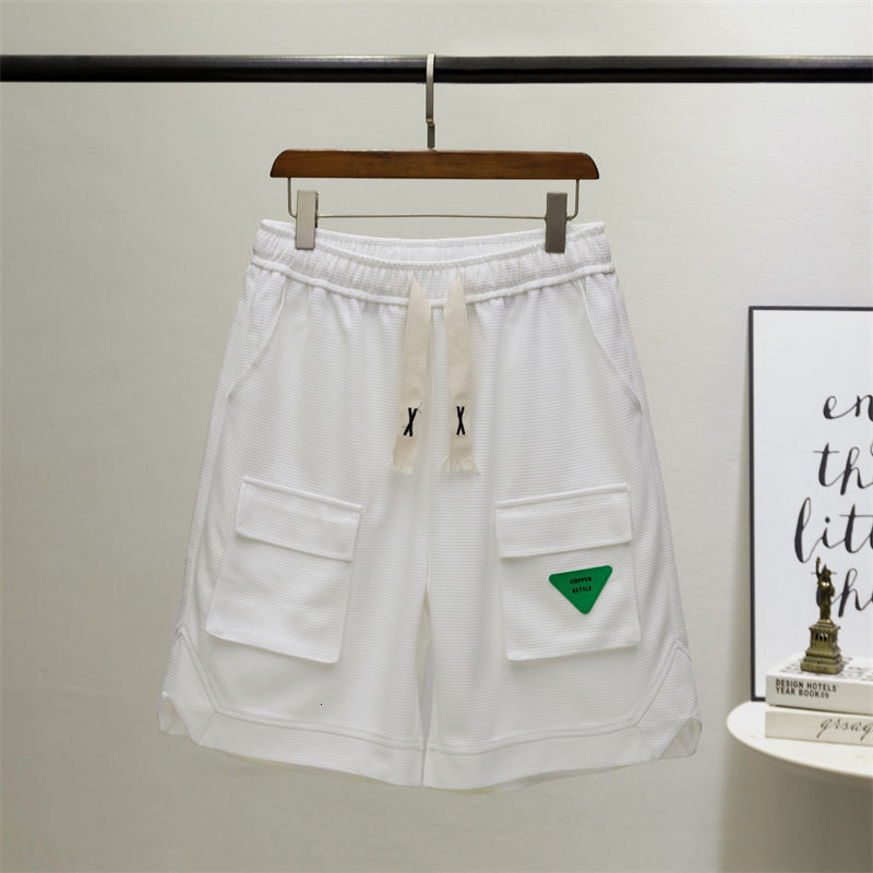 Men's Shorts Personalized shorts street goods large pockets half pants green leather labels drawstring casual shorts men's youth pants Capri