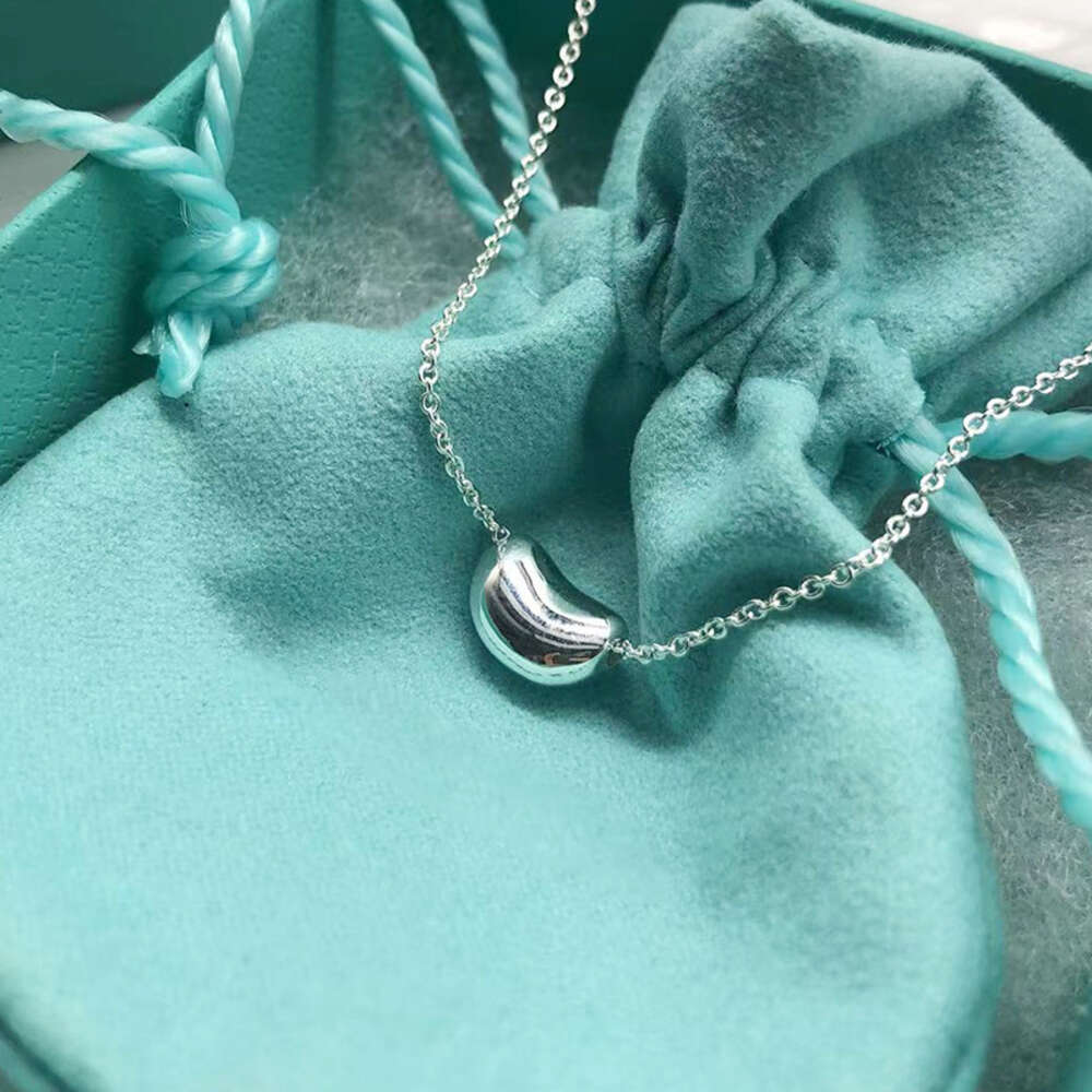 tiffanies tiffamies and co tiffanyxs tiffabies fashion accessories designer brands925 sterling silver lucky bean tassel necklace light luxury neckchain 2025 new