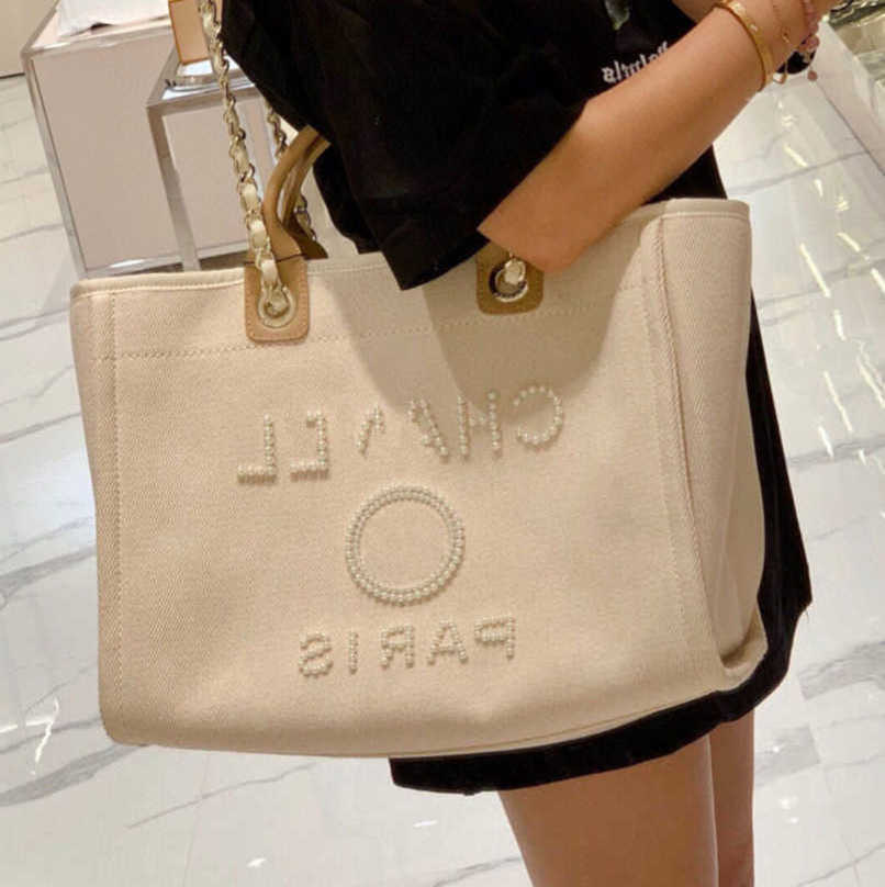 Fashion Luxury Women's Evening Bags Ch Brand Handbag Classic Canvas Beach Bag Designers Female Large Backpacks Capacity Small Chain Packs Big Shopping Handbags 77W7, Size45x30x15cm
Fashion Luxury Women's Evening Bags Ch Brand Handbag Classic Canvas Beach Bag Designers Female Large Backpacks Capacity Small Chain Packs Big Shopping Handbags 77W7, Size45x30x15cm