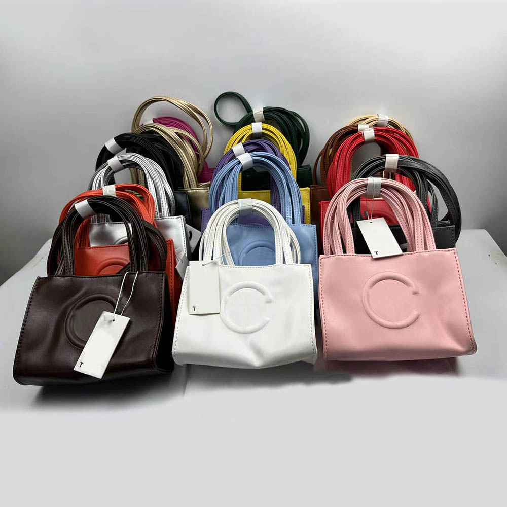 16 color Tbag Mini Designer Shoulder Bags Soft Leather Handbags Women Handbag Crossbody Luxury TotE Fashion Shopping Pink White Purse Satchels Bag, 17x7x14cm
16 color Tbag Mini Designer Shoulder Bags Soft Leather Handbags Women Handbag Crossbody Luxury TotE Fashion Shopping Pink White Purse Satchels Bag, 17x7x14cm