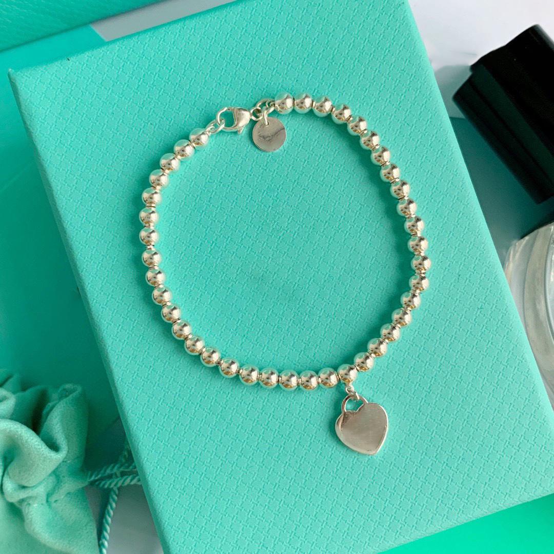 Original TIF Fashion Designer Pendant Bracelet 925 charm Women's English Heart Beaded Bracelet 4mm ball heart love bracelets for girlfriend Return lovers blue Box
Original TIF Fashion Designer Pendant Bracelet 925 charm Women's English Heart Beaded Bracelet 4mm ball heart love bracelets for girlfriend Return lovers blue Box