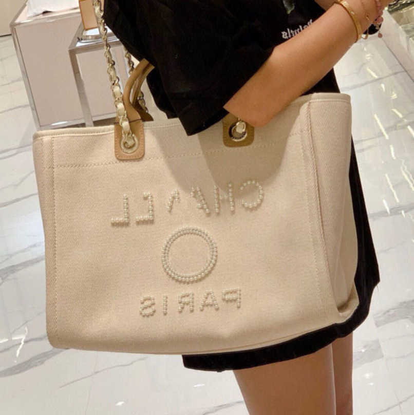 Women's Luxury Fashion Evening Bags Ch Brand Handbag Classic Canvas Beach Bag Designers Female Large Backpacks Capacity Small Chain Packs Big Shopping Handbags OTKK, Size45x30x15cm
Women's Luxury Fashion Evening Bags Ch Brand Handbag Classic Canvas Beach Bag Designers Female Large Backpacks Capacity Small Chain Packs Big Shopping Handbags OTKK, Size45x30x15cm