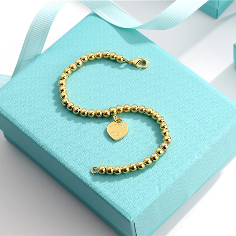 Classic sterling silver t gold Heart Beaded Bracelet Women couple 4mm ball Strands chain Gift for girlfriend love tag bracelet Return brand designer jewelry lovers
Classic sterling silver t gold Heart Beaded Bracelet Women couple 4mm ball Strands chain Gift for girlfriend love tag bracelet Return brand designer jewelry lovers