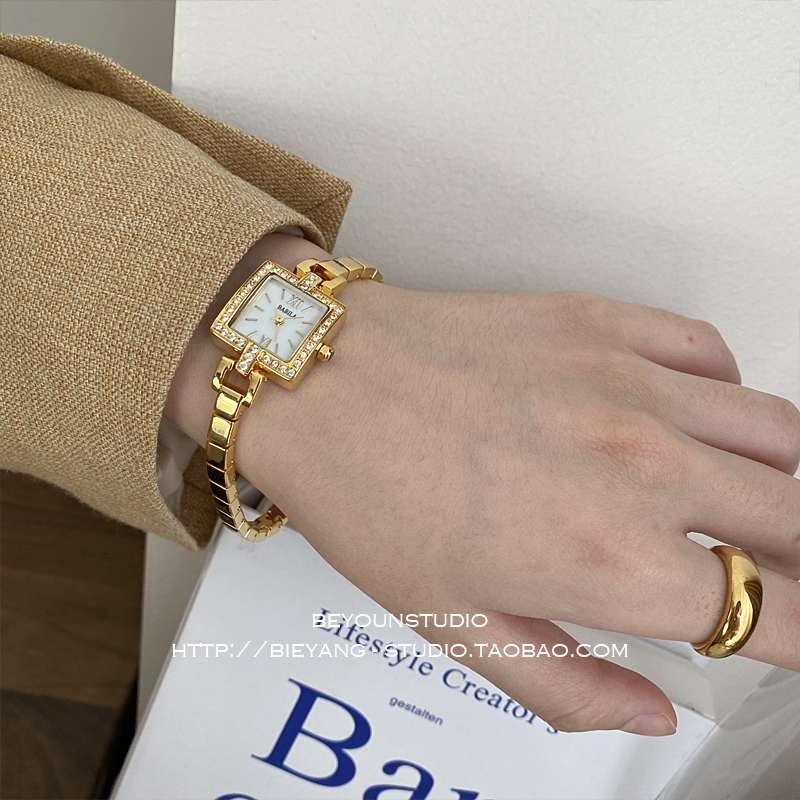 Women s Watches women s watch gold bracelet retro fashion square dial inlaid with diamonds small and fashionable for lovers 230410