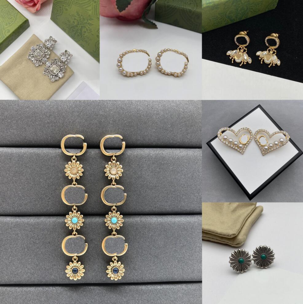 Designer Charm Stud Earrings Womens Retro rubine pendant Earrings Fashion High Quality Double Letter Jewelry Accessories classic Pearl Jewelry Earring
Designer Charm Stud Earrings Womens Retro rubine pendant Earrings Fashion High Quality Double Letter Jewelry Accessories classic Pearl Jewelry Earring