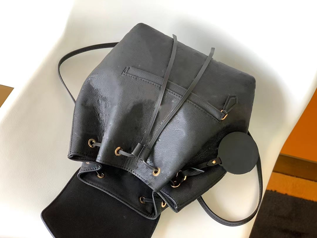 Designer Luxury Backpack with adjustable shoulder strap with retro metal buckle and pendant