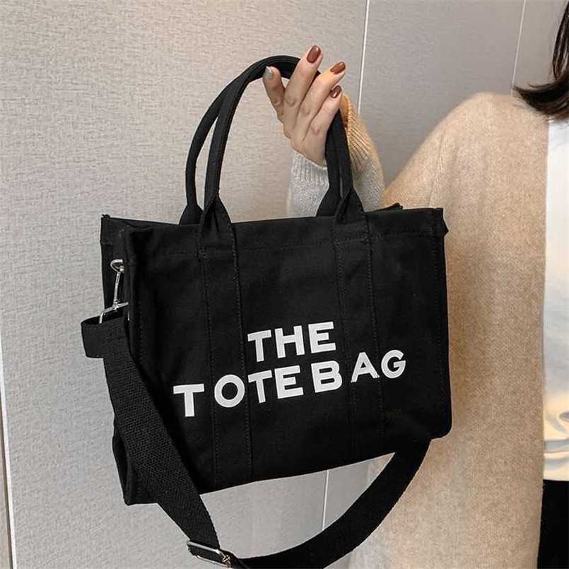 Designer bag 2023 Diagonal Straddle Bag Tote Bag Versatile Luxury Crossbody Women's Bag Tote Bag Simple Double Row Letter Canvas Bag factory outlet, Black
Designer bag 2023 Diagonal Straddle Bag Tote Bag Versatile Luxury Crossbody Women's Bag Tote Bag Simple Double Row Letter Canvas Bag factory outlet, Black