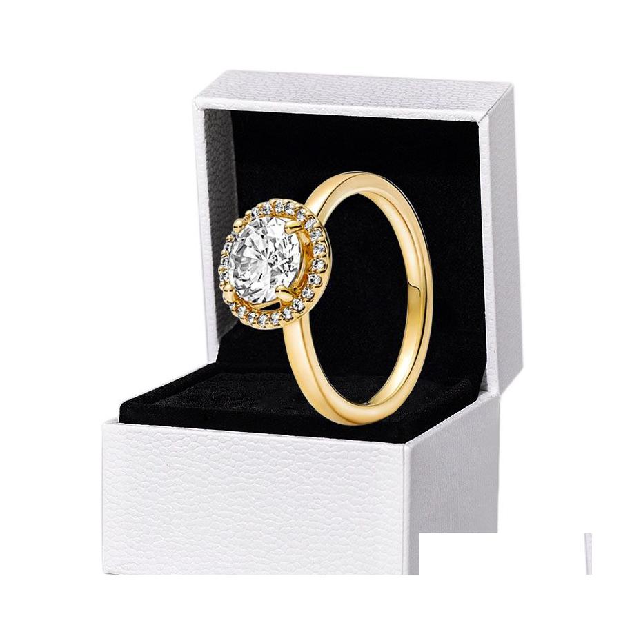 Wedding Rings Sparkling Round Halo Yellow Gold Plated Ring Women Girls Gift With Original Box Set For Pandora 925 Sterling Sier Drop Dhggx
Wedding Rings Sparkling Round Halo Yellow Gold Plated Ring Women Girls Gift With Original Box Set For Pandora 925 Sterling Sier Drop Dhggx