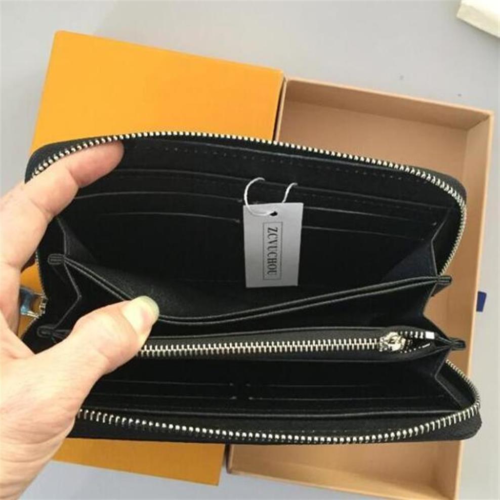 Whole 6 colors famous brand fashion single zipper designer men women leather wallet lady ladies long purse with orange box 600231P, Black flowers
Whole 6 colors famous brand fashion single zipper designer men women leather wallet lady ladies long purse with orange box 600231P, Black flowers