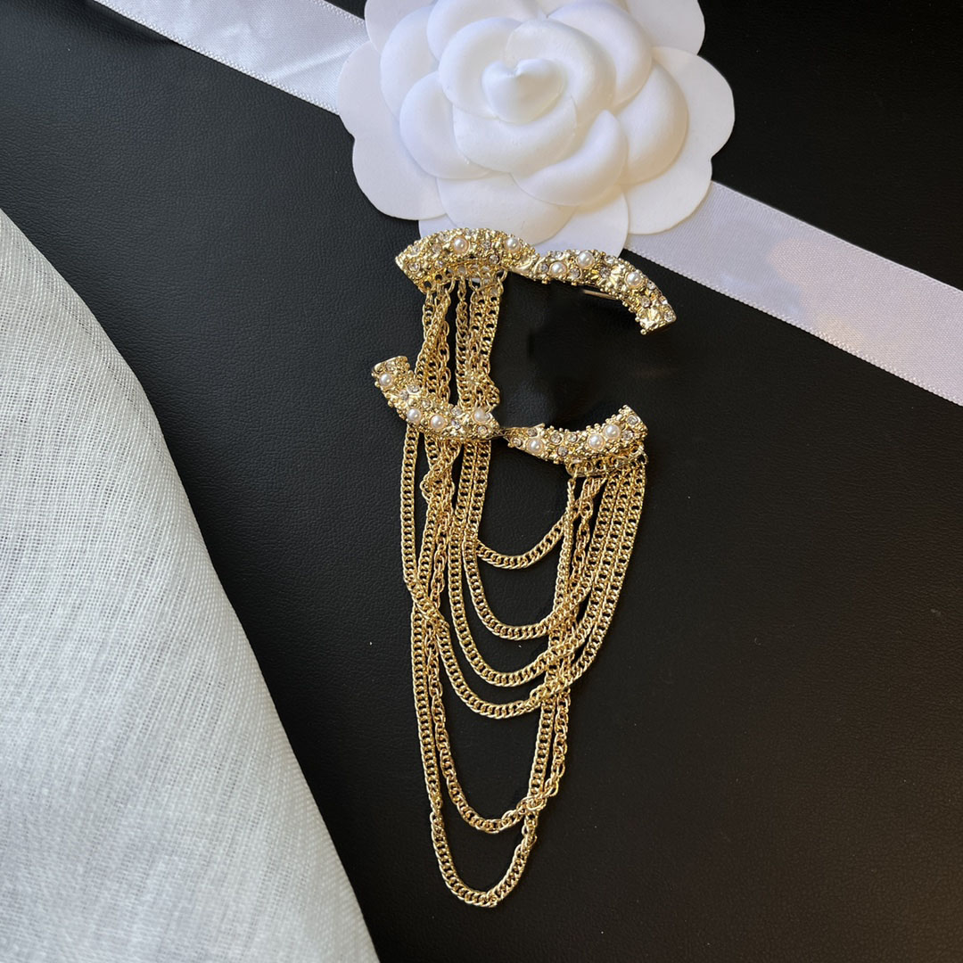 Brand Designer Tassel Stainless Steel Brooches Sweater for Men Women Crystal Rhinestone Suit Collar Pin 18K Gold Plated Brooch Jewelry Gift D119
Brand Designer Tassel Stainless Steel Brooches Sweater for Men Women Crystal Rhinestone Suit Collar Pin 18K Gold Plated Brooch Jewelry Gift D119