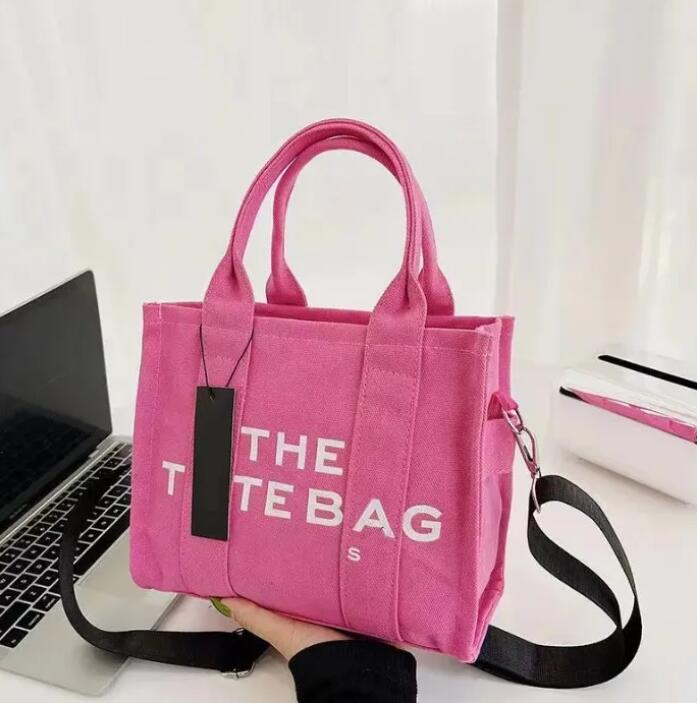 Marc Jocobss tote bages Wallets Designer Bags handbag Shoulder Women Classic Purse canvas Luxury HandbagsThe Totes bag
Marc Jocobss tote bages Wallets Designer Bags handbag Shoulder Women Classic Purse canvas Luxury HandbagsThe Totes bag