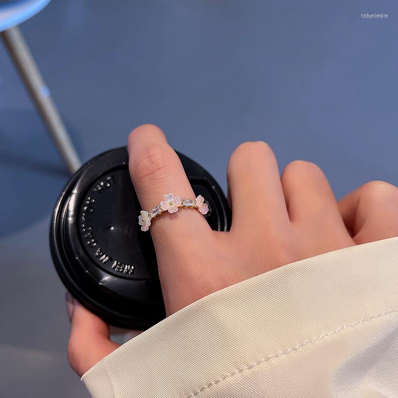 Cluster Rings Elegant Small White Flowers Ring For Women Opening Adjustable Trendy Delicate Jewelry Female Fashion Index Finger RingsCluster
Cluster Rings Elegant Small White Flowers Ring For Women Opening Adjustable Trendy Delicate Jewelry Female Fashion Index Finger RingsCluster