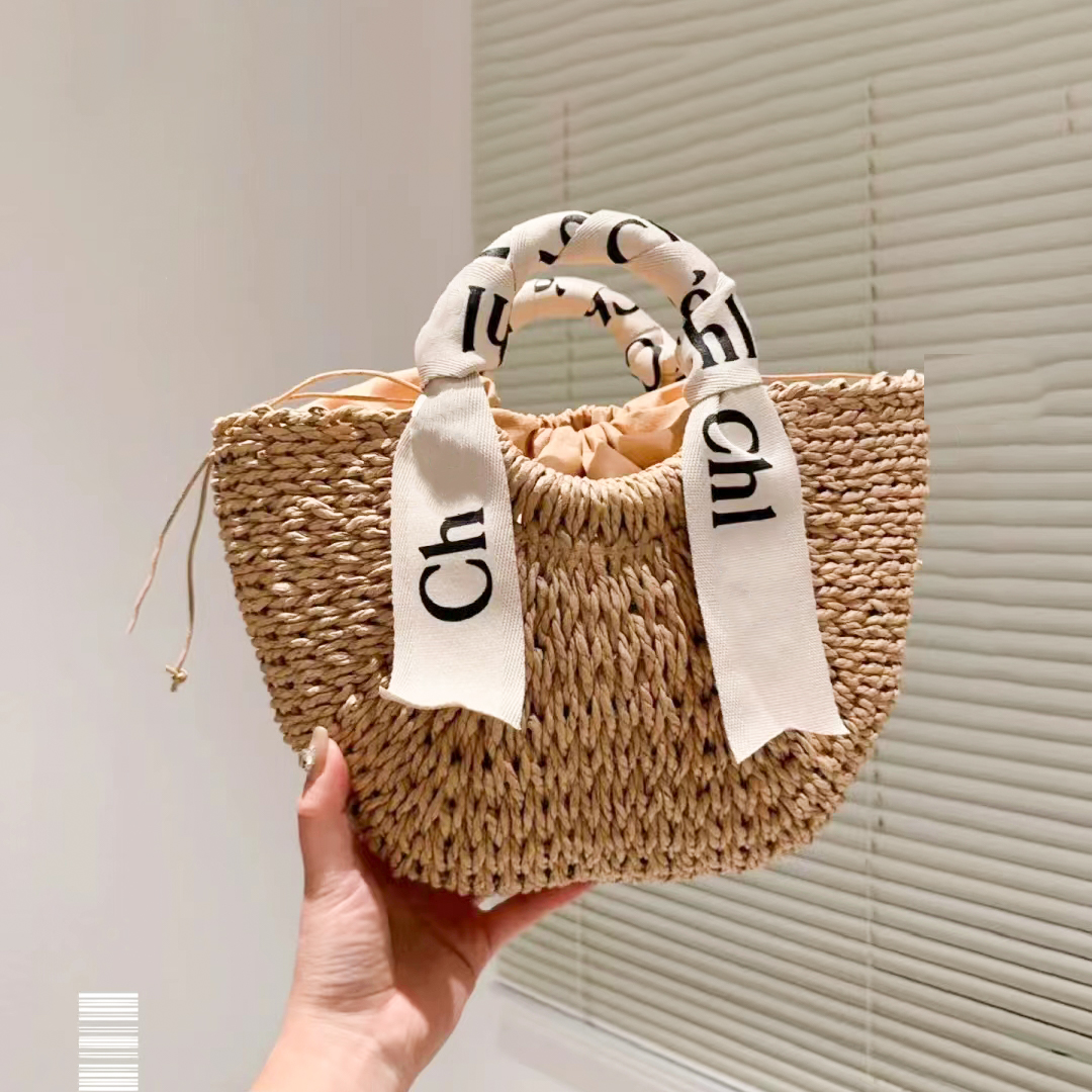 Designer Beach Woody bag Straw Womens mens Luxury Raffia weave clutch handbag crossbody shoulder shopping bags top handle pochette famous large tote Bag purse hobo
Designer Beach Woody bag Straw Womens mens Luxury Raffia weave clutch handbag crossbody shoulder shopping bags top handle pochette famous large tote Bag purse hobo
