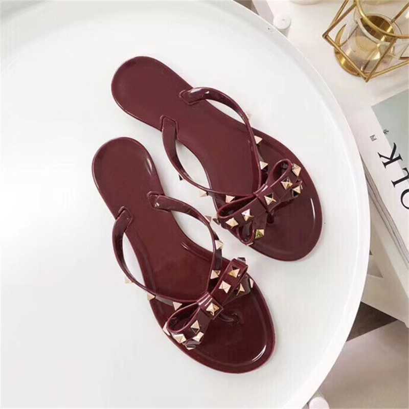 2023 summer new rivet bow flat bottom herringbone slippers women's PVC leisure clip toe wear beach sandals, Black
2023 summer new rivet bow flat bottom herringbone slippers women's PVC leisure clip toe wear beach sandals, Black