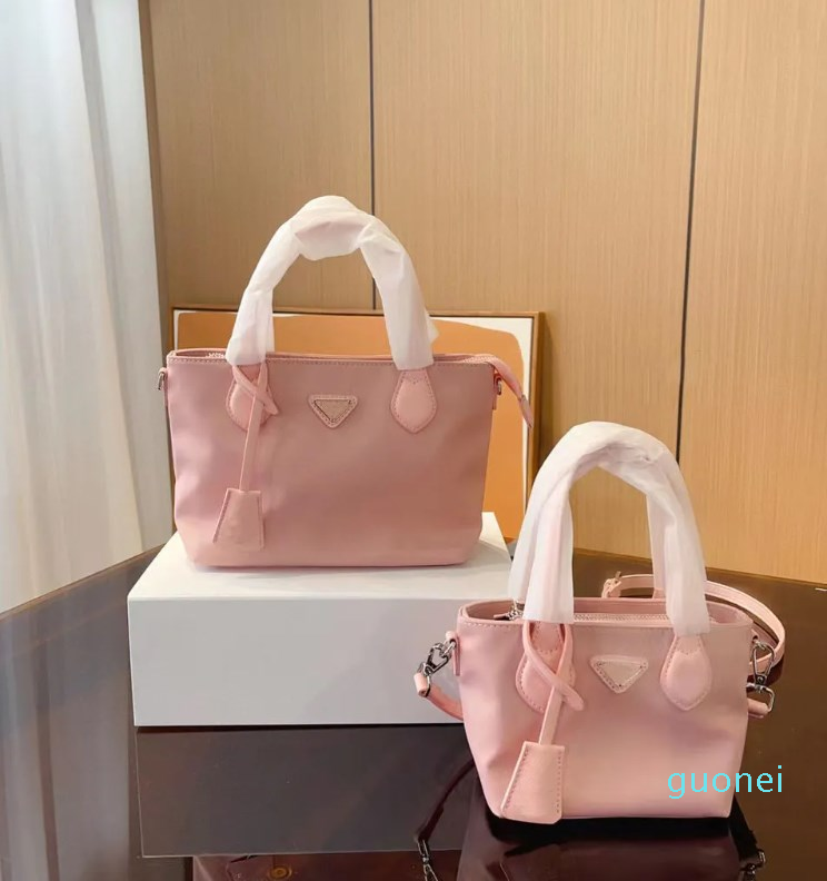 Nylon Tote Bag Designer Shoulder Handbag Soft Bags Women Crossbody Bags Fashion Messenger Bag 2sizes 3colors Purse Luxury Pocket Lady Outdoor Packs, Pink
Nylon Tote Bag Designer Shoulder Handbag Soft Bags Women Crossbody Bags Fashion Messenger Bag 2sizes 3colors Purse Luxury Pocket Lady Outdoor Packs, Pink