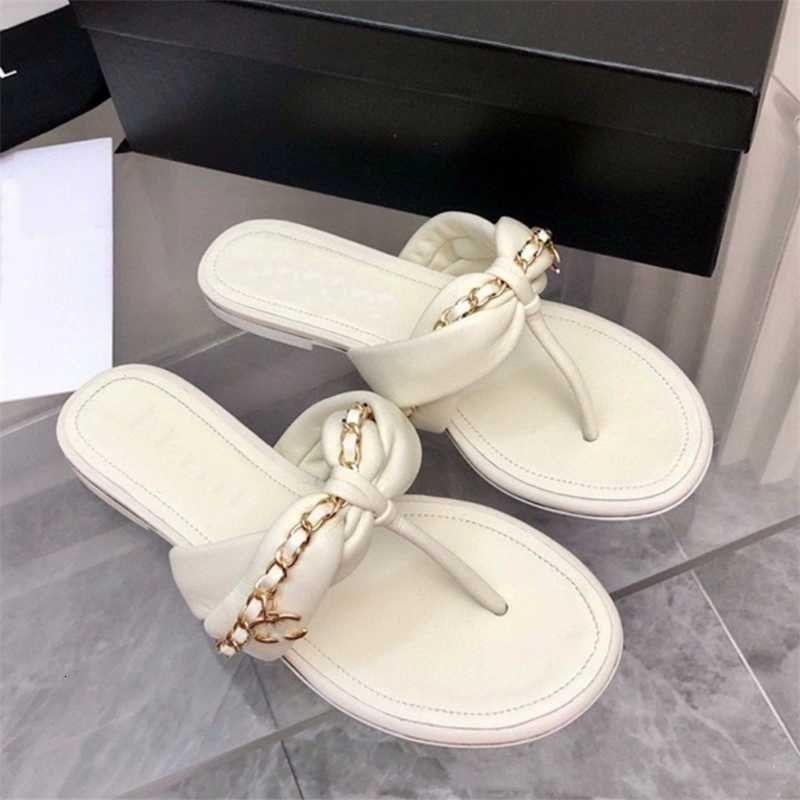 

High version 2023 new small fragrance metal chain flip flops clip feet women's flat bottoms wear versatile slippers, White