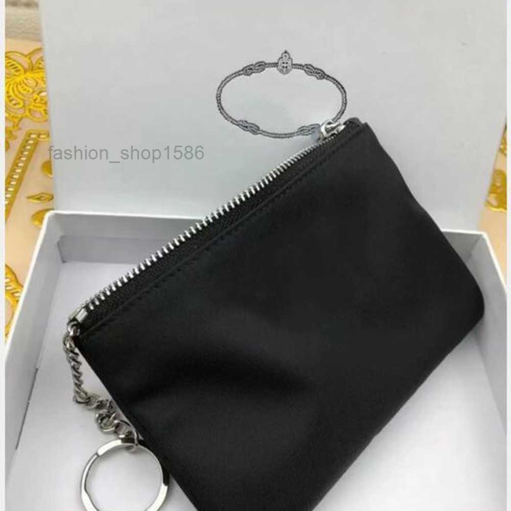 Luxury Designer Key Chain Nylon Canvas Pouch Men Women Mini Wallets Keychains Black Zip Pocket Purse Lover Keychains Card Holders Keyring Fashion Accessories
Luxury Designer Key Chain Nylon Canvas Pouch Men Women Mini Wallets Keychains Black Zip Pocket Purse Lover Keychains Card Holders Keyring Fashion Accessories