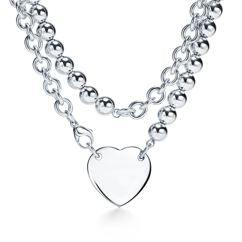 Designer single peach heart necklace woman stainless steel pendant luxury jewelry Valentine's Day Christmas gift wholesale
Designer single peach heart necklace woman stainless steel pendant luxury jewelry Valentine's Day Christmas gift wholesale