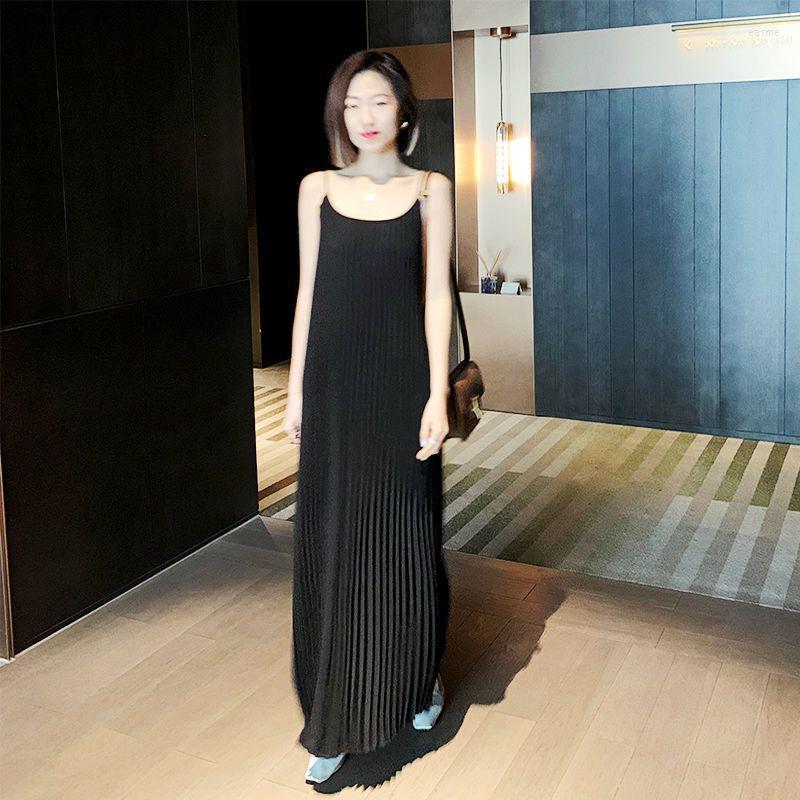 Casual Dresses Fashion Black Strap Sleeveless Dress Women 2023 Summer Style Over-the-Knee Loose Underlay Pleated Long Female Tops
Casual Dresses Fashion Black Strap Sleeveless Dress Women 2023 Summer Style Over-the-Knee Loose Underlay Pleated Long Female Tops