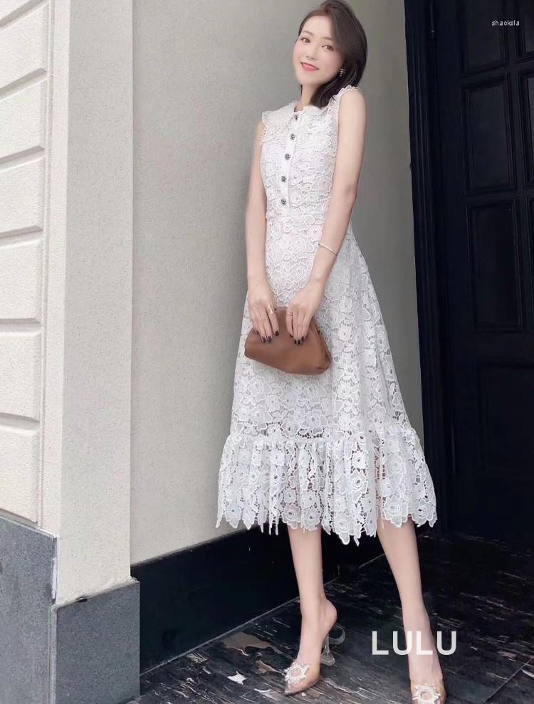 Casual Dresses Sexy Hollow Out Sleeveless White Dress Women Fashion Empire Ruffles Shirt With Buttons Sweet Girls Lace Long
Casual Dresses Sexy Hollow Out Sleeveless White Dress Women Fashion Empire Ruffles Shirt With Buttons Sweet Girls Lace Long