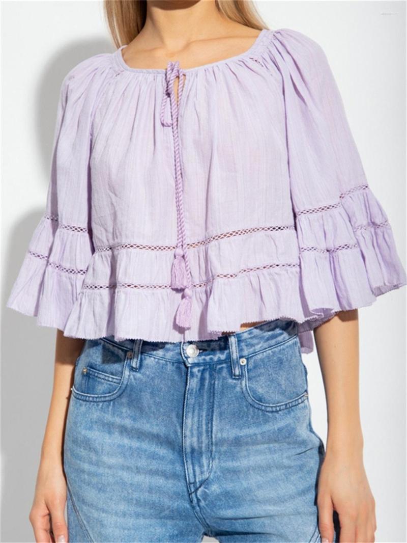 Women's Blouses 2023 Women Shirt White Purple Black Ruffles Hollow Out Sweet Flared Sleeve Female Drawstring Loose O-neck Top
Women's Blouses 2023 Women Shirt White Purple Black Ruffles Hollow Out Sweet Flared Sleeve Female Drawstring Loose O-neck Top
