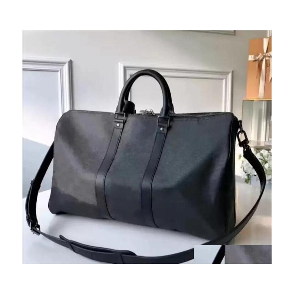 Duffel Bags 10A Duffle Designer Bag Classic 45Cm 50Cm 55Cm Travel Lage For Men Real Leather Top Quality Women Crossbody Totes Shoder Dhmvd
Duffel Bags 10A Duffle Designer Bag Classic 45Cm 50Cm 55Cm Travel Lage For Men Real Leather Top Quality Women Crossbody Totes Shoder Dhmvd