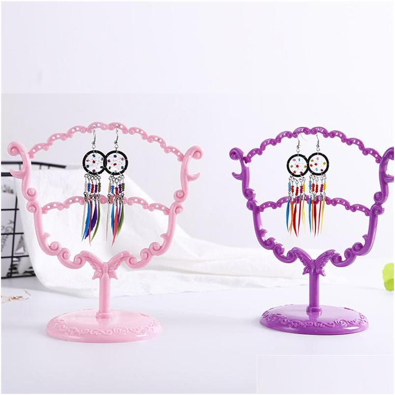 Jewelry Stand New Creative Design 3 Colors Plastic Display Earing Pendant Holder Fan Shape Drop Delivery Packaging Dhgarden Dhmdi
Jewelry Stand New Creative Design 3 Colors Plastic Display Earing Pendant Holder Fan Shape Drop Delivery Packaging Dhgarden Dhmdi