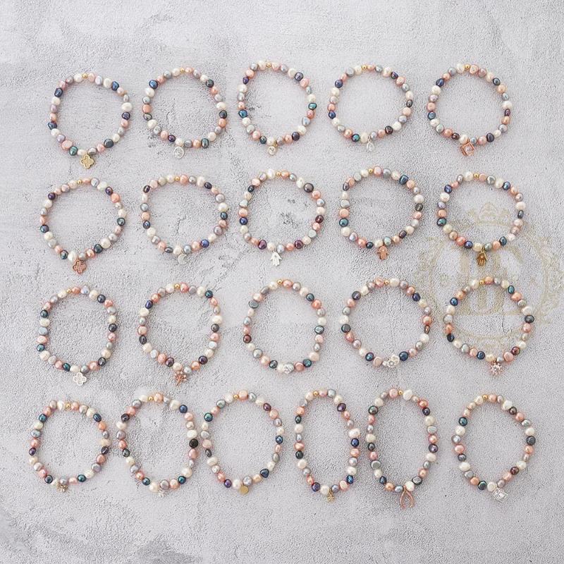 Strand One Fashion Jewelry Fresh Water Pearl And Plated Charm With Elastic Cord Bracelet - 54mm (BE187)
Strand One Fashion Jewelry Fresh Water Pearl And Plated Charm With Elastic Cord Bracelet - 54mm (BE187)