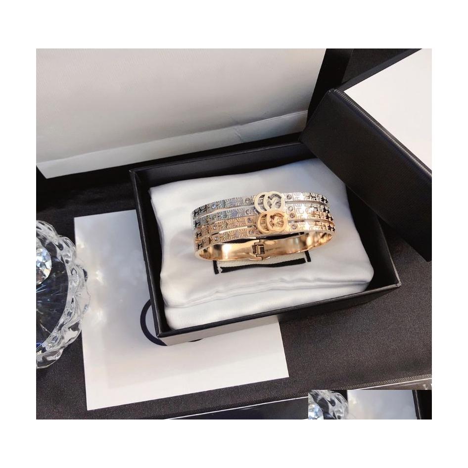 Bangle Designer Bracelet Charm Luxury Bracelets Women Letter Jewelry Plated Stainless Steel 18K Gold Wristband Cuff Fashion Party Dr Dhe9N
Bangle Designer Bracelet Charm Luxury Bracelets Women Letter Jewelry Plated Stainless Steel 18K Gold Wristband Cuff Fashion Party Dr Dhe9N