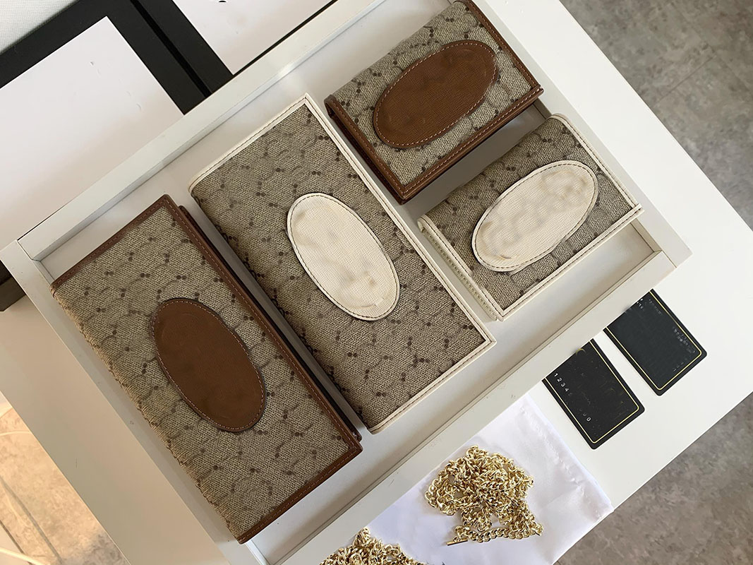 Hand bag Womens Bags key case designer purse luxurious Classic model top quality corium Storage card package Womens designer clutch bag Hand bag designer wallet
Hand bag Womens Bags key case designer purse luxurious Classic model top quality corium Storage card package Womens designer clutch bag Hand bag designer wallet