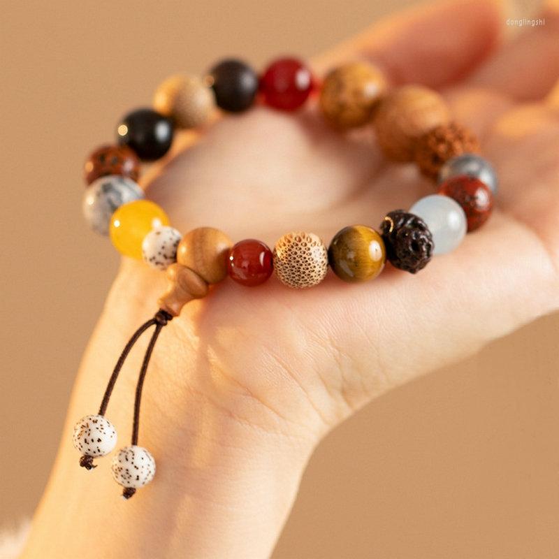 Strand Natural 18 Seeds Bodhi Buddhist Buddha Wood Prayer Beaded Knot Bracelet Unisex Men Bracelets Bangles For Women 
Strand Natural 18 Seeds Bodhi Buddhist Buddha Wood Prayer Beaded Knot Bracelet Unisex Men Bracelets Bangles For Women