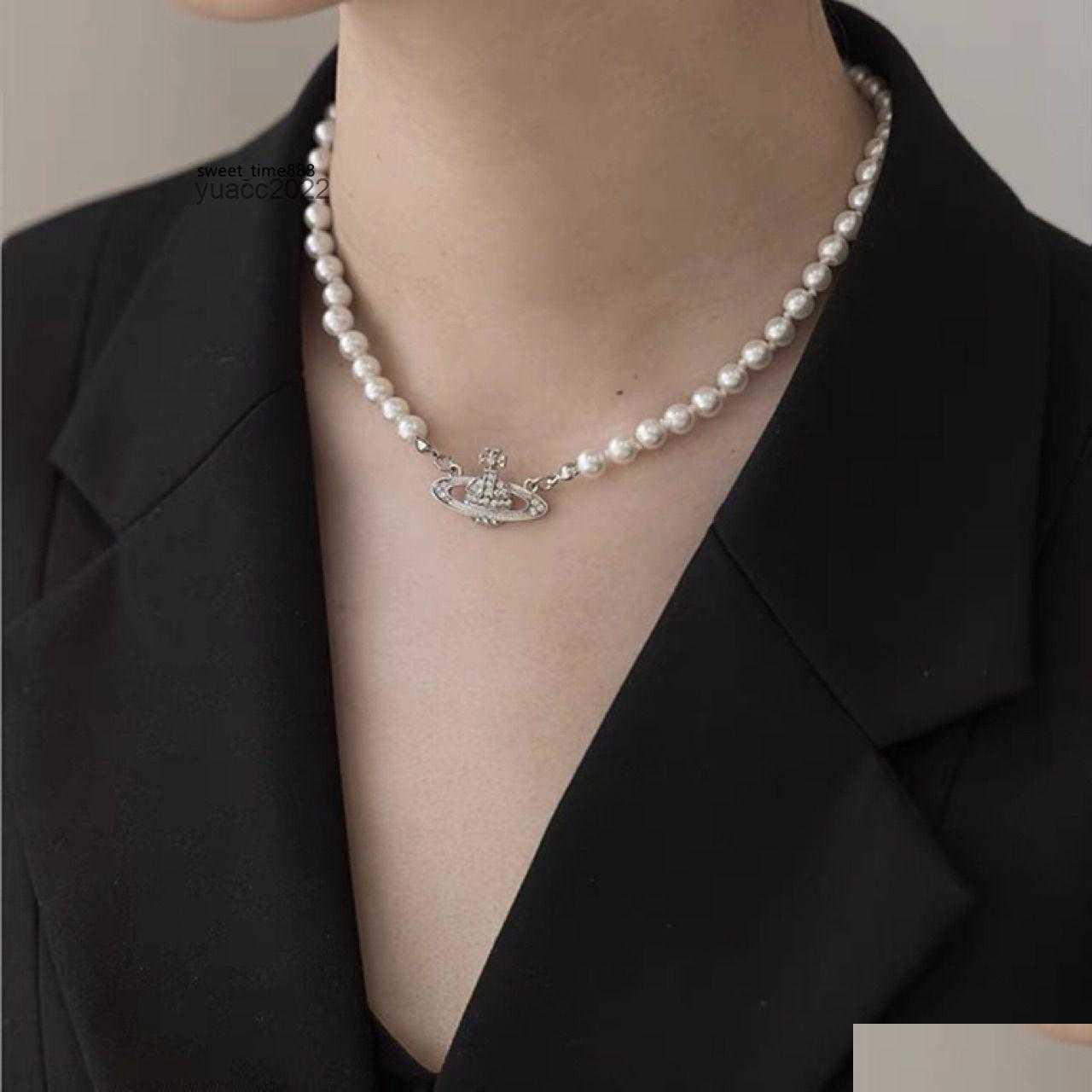 Pendant Necklaces Chaopai Diamond Encrusted Pearl Necklace Womens Net Red Light Luxury Vivian Westwood Fl Planet Clavicle Drop Deliv Dhzks
Pendant Necklaces Chaopai Diamond Encrusted Pearl Necklace Womens Net Red Light Luxury Vivian Westwood Fl Planet Clavicle Drop Deliv Dhzks