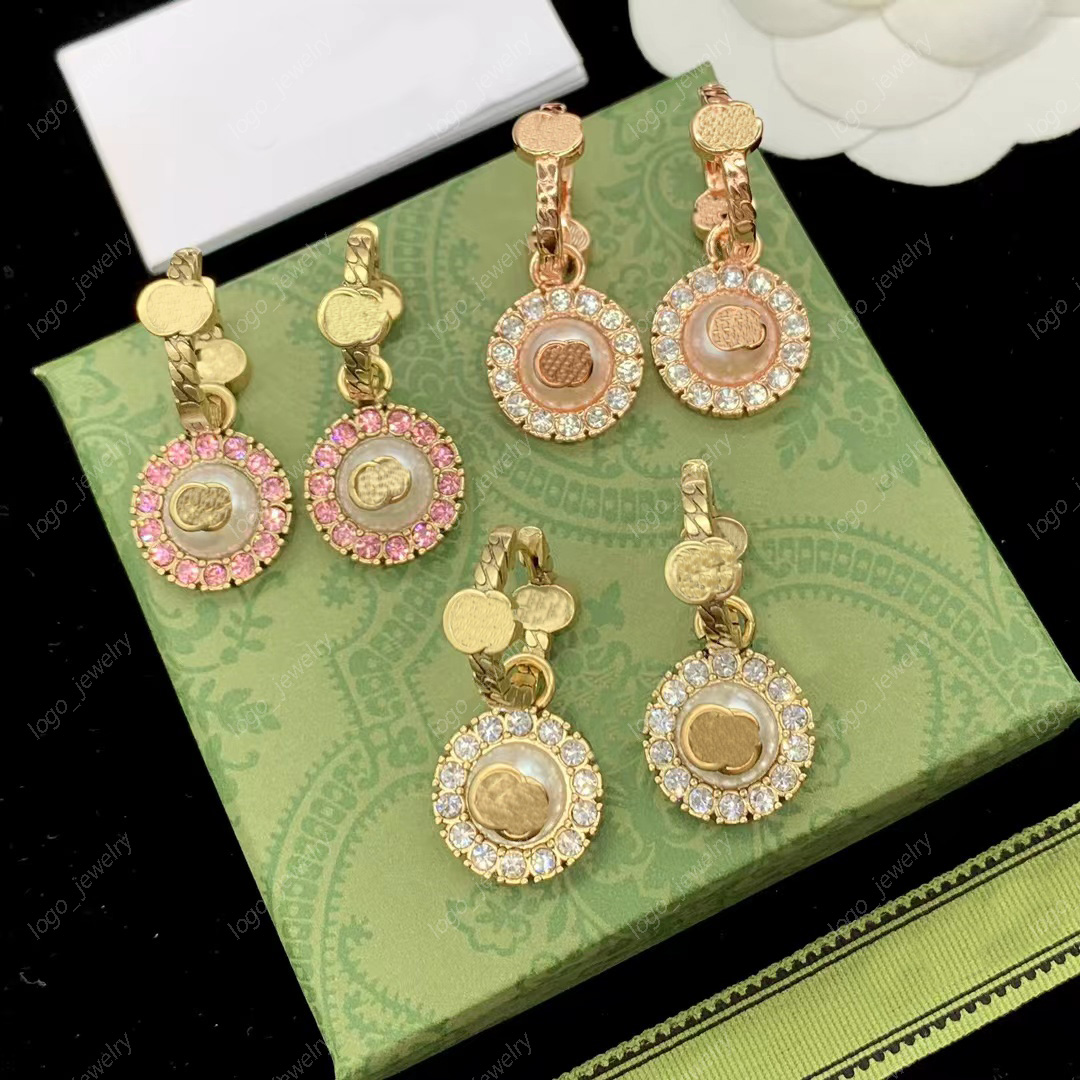 2023 New fashion flower Charm earrings double G letter brass material personality earrings women's wedding party birthday gift designer jewelry with box
2023 New fashion flower Charm earrings double G letter brass material personality earrings women's wedding party birthday gift designer jewelry with box