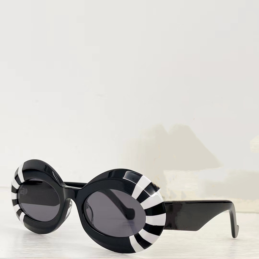 23SS Season Oversized Oval Sunglasses For Women In Acetate Mens And Womens Fashion Trend Style High Quality Glasses 100% UV Protection 40091 With high-end random box
23SS Season Oversized Oval Sunglasses For Women In Acetate Mens And Womens Fashion Trend Style High Quality Glasses 100% UV Protection 40091 With high-end random box
