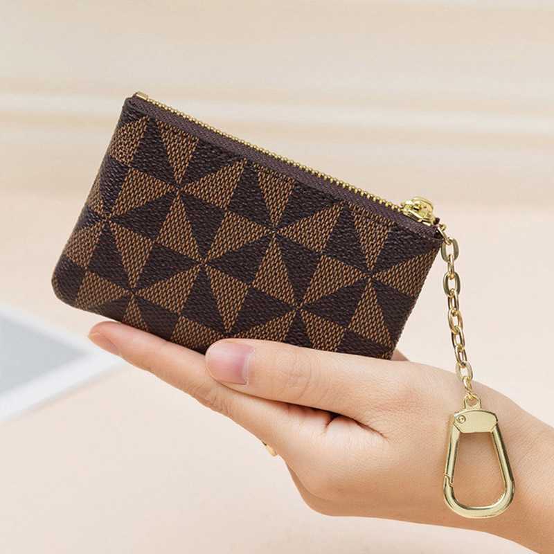 Luxury Leather Plaid Mini Storage Bag Keychain Men Women Key Bag Small Coin Purse Women Lipstick Bags Key Chain Pendant Wallet
Luxury Leather Plaid Mini Storage Bag Keychain Men Women Key Bag Small Coin Purse Women Lipstick Bags Key Chain Pendant Wallet