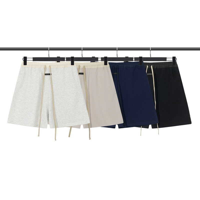 ESS shorts Luxury Mens Designer Fog FEARs OF GOD Season 7 drawstring Mens Womens loose couples leisure solid color sports five point shorts trend casual short, Black
ESS shorts Luxury Mens Designer Fog FEARs OF GOD Season 7 drawstring Mens Womens loose couples leisure solid color sports five point shorts trend casual short, Black