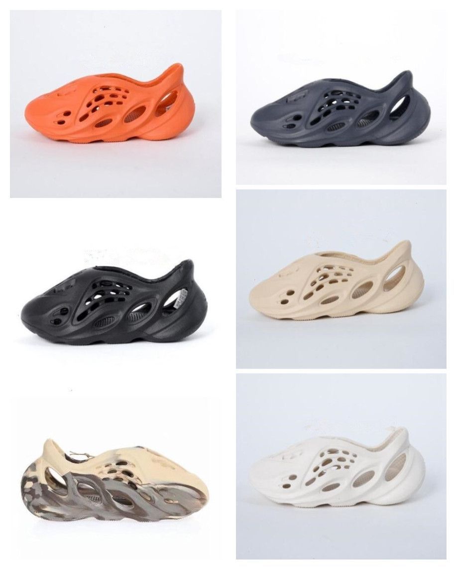 Fashion Kids Slippers Yeezie Foams Runer Konye Slides Sandals Outdoor Shoes Toddlers Childrens Triple Red White Black Desert Sand Bone Resin
Fashion Kids Slippers Yeezie Foams Runer Konye Slides Sandals Outdoor Shoes Toddlers Childrens Triple Red White Black Desert Sand Bone Resin