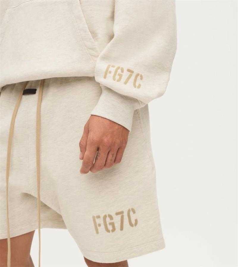 ESS shorts Luxury Mens Designer FEARs OF GOD Main Line Season 7 High Street Drawstring Flocking FG7C Printed Men's Loose Shorts casual short, Apricot 
ESS shorts Luxury Mens Designer FEARs OF GOD Main Line Season 7 High Street Drawstring Flocking FG7C Printed Men's Loose Shorts casual short, Apricot