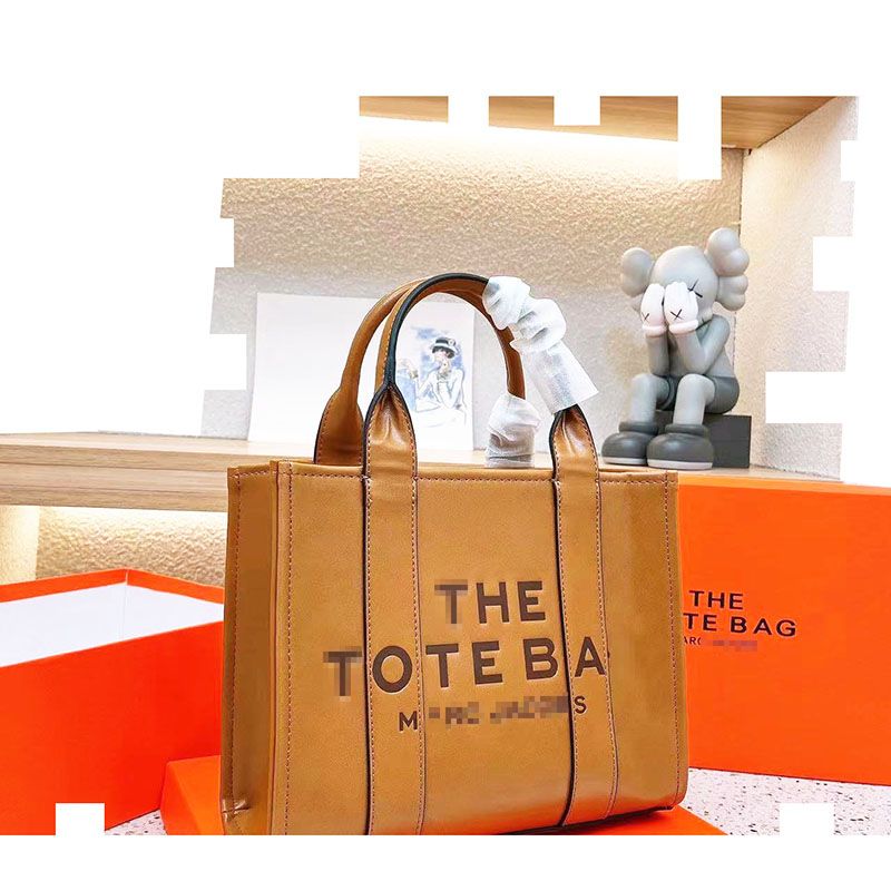 Designer 5A the tote bag for woman embossing letter handbag luxury shoulder bags large capacity 34cm brown leather handbags women canvas topbags MJ totes bages, 3a canvas black 30cm
Designer 5A the tote bag for woman embossing letter handbag luxury shoulder bags large capacity 34cm brown leather handbags women canvas topbags MJ totes bages, 3a canvas black 30cm