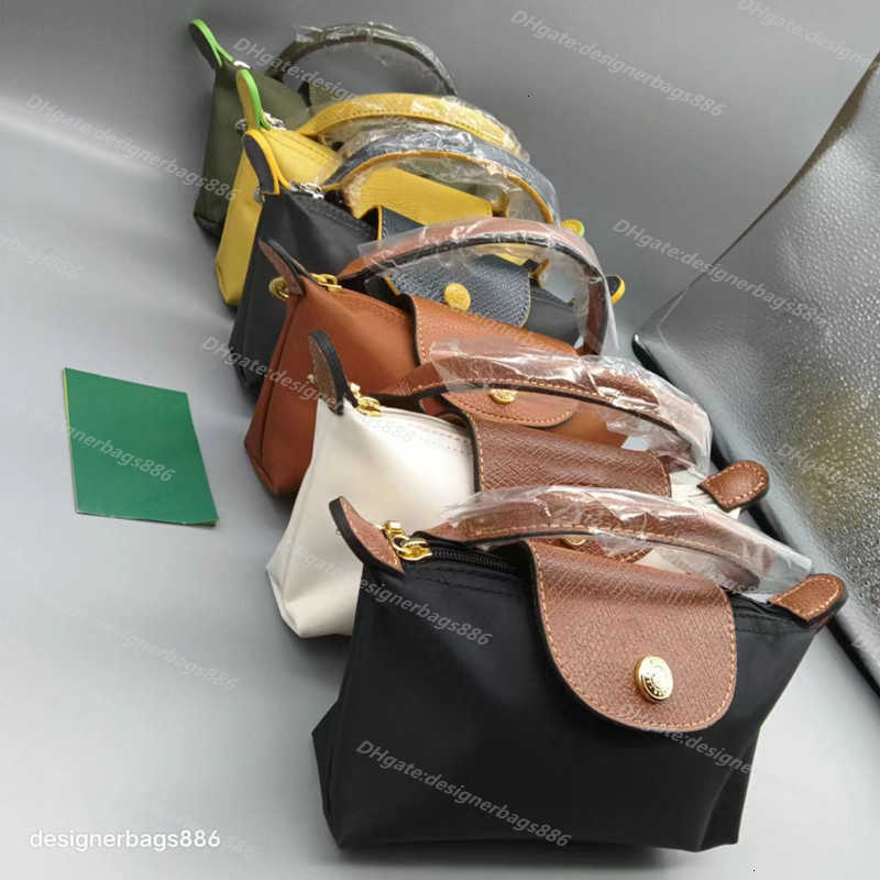 High quality Bag Chain Mini Single-handle handbags designers bag Fresh Dumpling luxury crossbody Waterproof Nylon Leisure Hand Purse Hualong handbag designer bags, 300 gun gray with chain
High quality Bag Chain Mini Single-handle handbags designers bag Fresh Dumpling luxury crossbody Waterproof Nylon Leisure Hand Purse Hualong handbag designer bags, 300 gun gray with chain