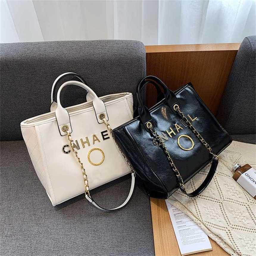 50% off Luxury Designer Handbags Women's Beach Metal Badge Tote Bag Small Capacity Large Leather One Shoulder Abzr, Sky blue
50% off Luxury Designer Handbags Women's Beach Metal Badge Tote Bag Small Capacity Large Leather One Shoulder Abzr, Sky blue