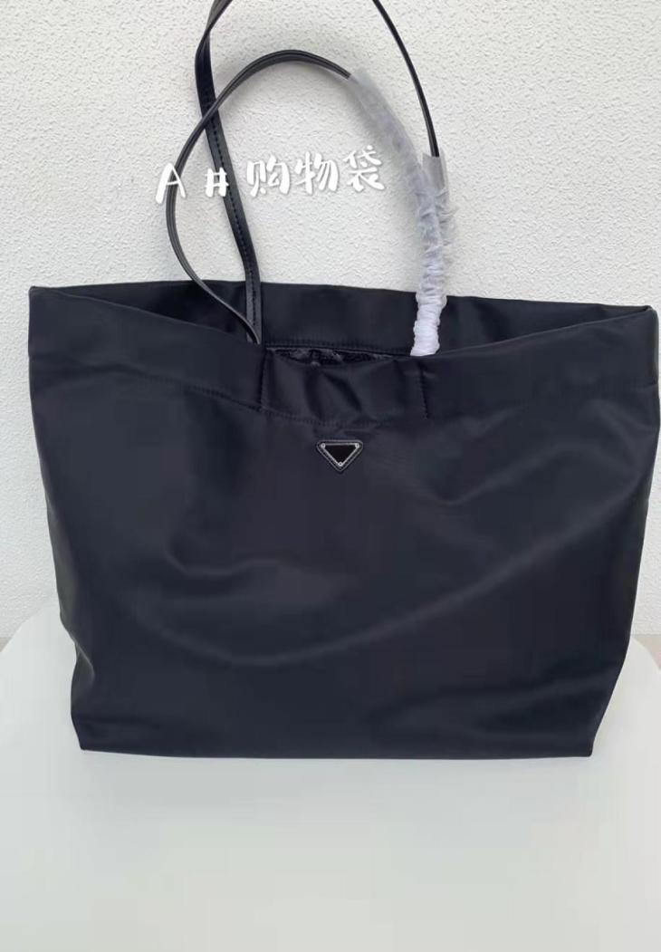 2022 Ladies Large Brand Bag Shopping Bag High Quality Fashion Recycled Nylon Tote Shoulder Luxury Designer Handbag6960829, Black
2022 Ladies Large Brand Bag Shopping Bag High Quality Fashion Recycled Nylon Tote Shoulder Luxury Designer Handbag6960829, Black