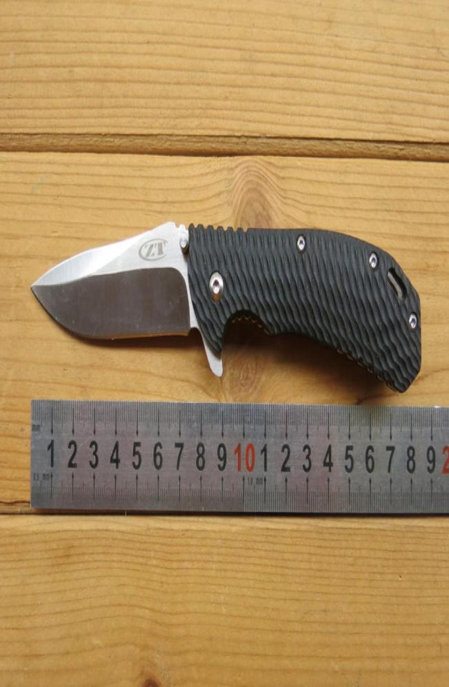 Zero Tolerance ZT 0560 Folding Knife Mini Small Flipper 420HC Blade G10 Handle EDC Tactical Survival Camping Sport Tools Gear1399849
Zero Tolerance ZT 0560 Folding Knife Mini Small Flipper 420HC Blade G10 Handle EDC Tactical Survival Camping Sport Tools Gear1399849