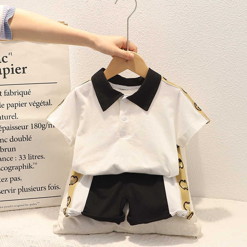 Clothing Sets Boys summer suit lapel new children's tide trendy sports short sleeve two-piece T230420
Clothing Sets Boys summer suit lapel new children's tide trendy sports short sleeve two-piece T230420