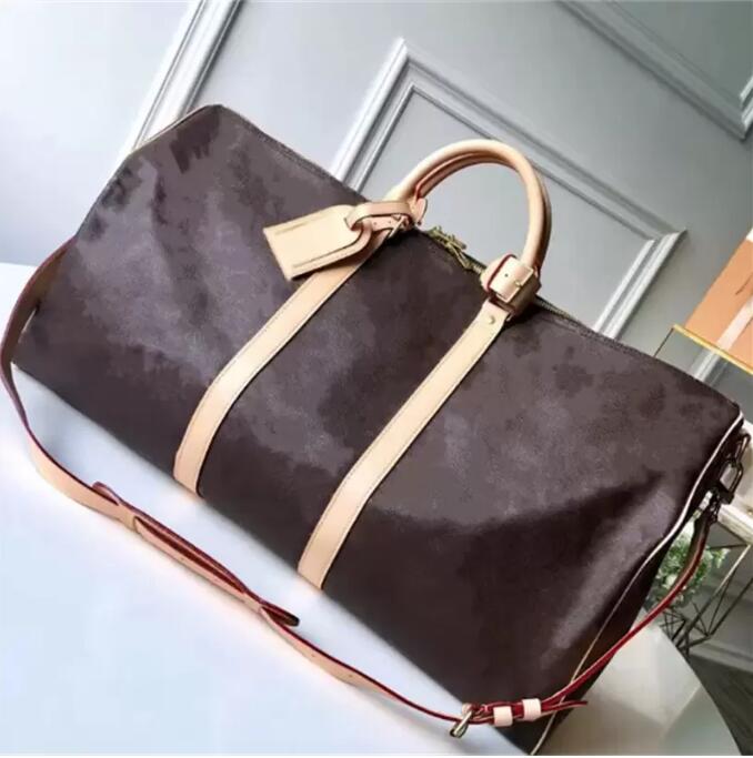 2023 Top Quality New Men Duffle Bag Women Travel Bags Hand Luggage Travel Bags Men Pu Leather Handbags Large CrossBody Bags Totes 55cm 413#
2023 Top Quality New Men Duffle Bag Women Travel Bags Hand Luggage Travel Bags Men Pu Leather Handbags Large CrossBody Bags Totes 55cm 413#