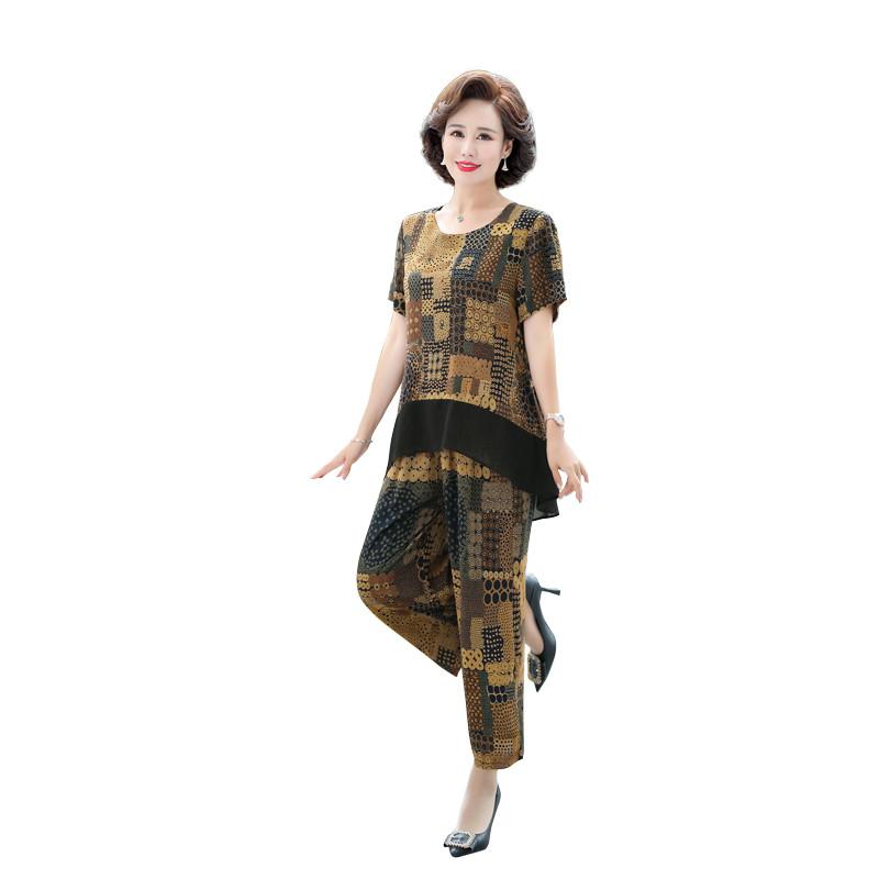 Dress NEW Middleaged Moother Sets Summer Floarl Short Sleeve Tshirt Wide Leg Pants 2 Pcs Pants Suits Mom Elegant Suit Wear
Dress NEW Middleaged Moother Sets Summer Floarl Short Sleeve Tshirt Wide Leg Pants 2 Pcs Pants Suits Mom Elegant Suit Wear